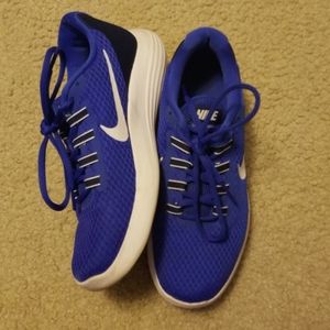 Blue Nike tennis shoes